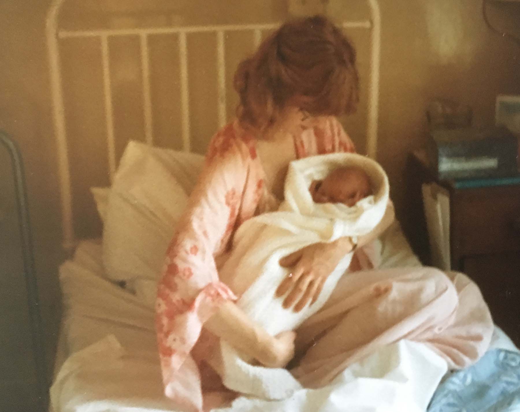 New mother Katherine with baby James 1980